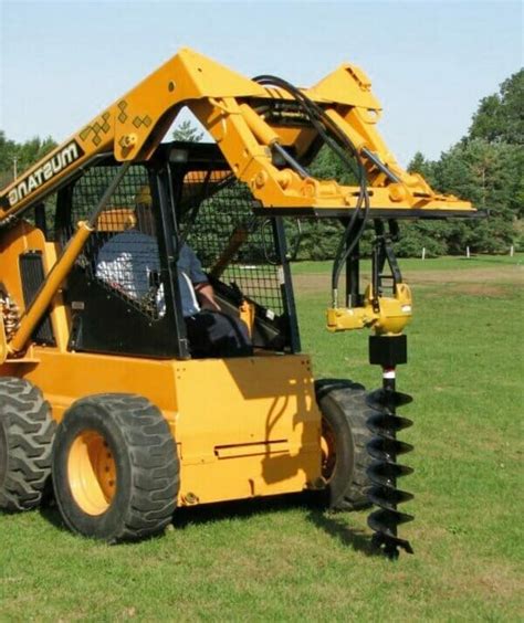 can you excavate with a skid steer|skid steer post hole digger.